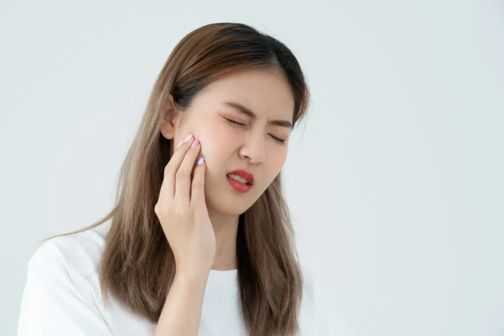 Woman experiencing Invisalign pain